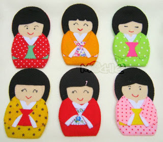 Seis modelos de muñeca japonesa kokeshi de fieltro